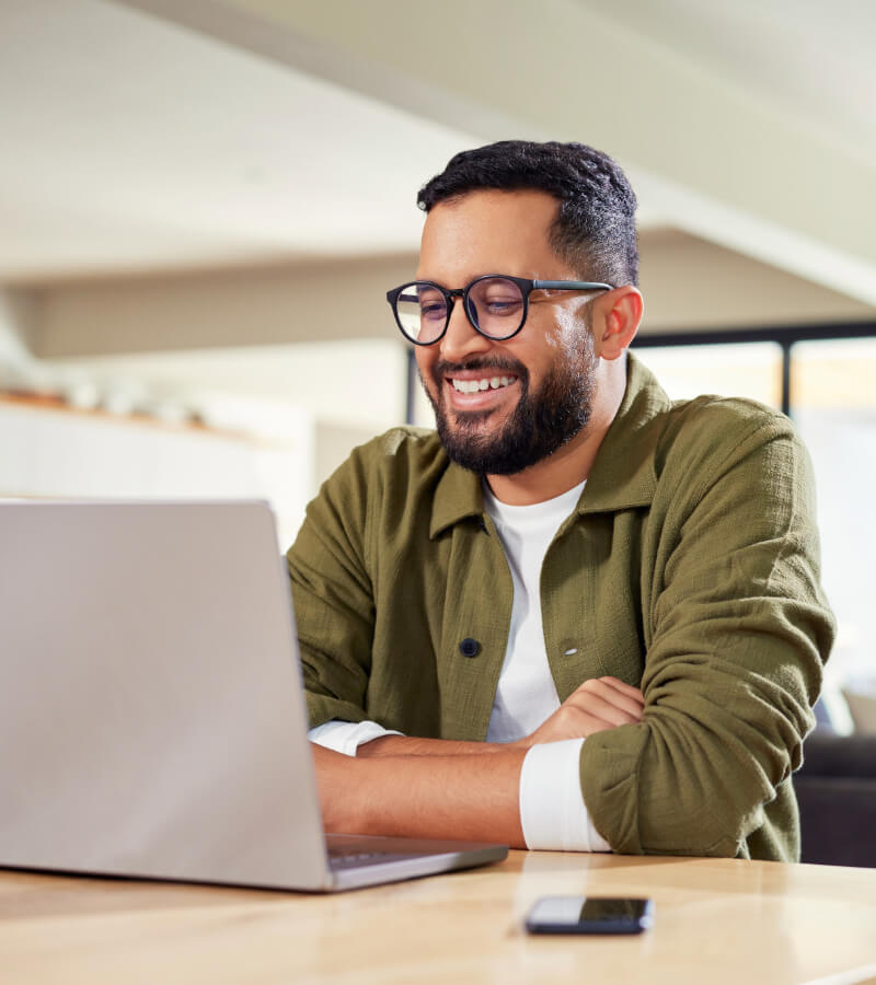 Man using business internet service on laptop